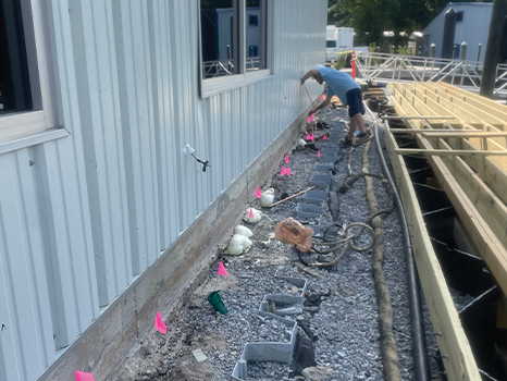 Gulf Coast Soil and Seawall Doctors injection job in progress